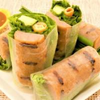Spam Spring Rolls · 2 pieces.  Vietnamese spam fresh spring rolls served with peanut sauce.