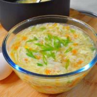 Egg Drop Soup · Fluffy egg drop soup with egg, peas & carrots and tofu.