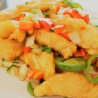 Lemongrass Fish · Spicy, salt & pepper battered basa fish fillet stir fried with fresh lemongrass, onions and ...