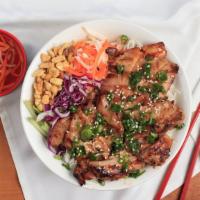 Bun Ga · Grilled teriyaki chicken with rice vermicelli noodles served with fresh salad & fish sauce.