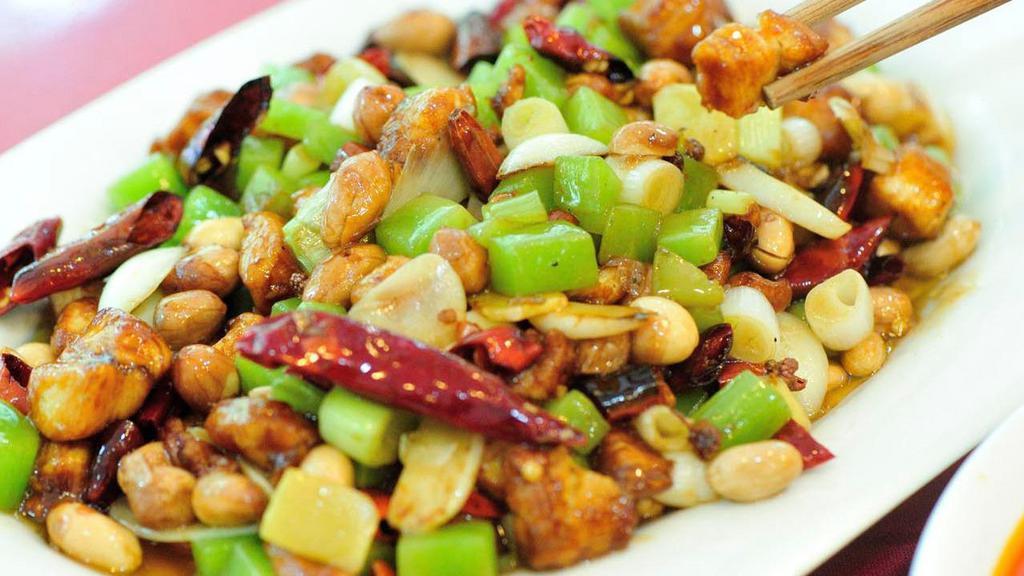 Vegetarian Kung Pao · Spicy Shanghai kung pao vegetables & tofu stir fried with peanuts, chili, bell peppers, onions & garlic served with steamed rice.