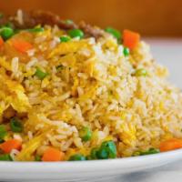 Side Fried Rice · Side fried rice with egg, peas & carrots and onions.