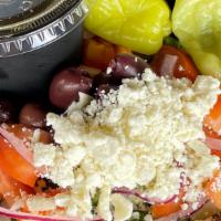 Greek Salad · Romaine spring mix, cucumbers, tomatoes, bell peppers, red onions, kalamata olives and feta ...