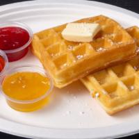 2 Pieces Cozy Corner Waffle · Belgian waffle cooked in cast iron with syrup, butter, and powdered sugar.