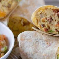 Fajita Veggie Breakfast Burrito · Two scrambled eggs, sauteed peppers and onions, tater tots, and melted cheese on a fresh flo...