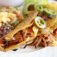 Red Quesadilla · Red quesadilla stuff with a really tasty barbacoa