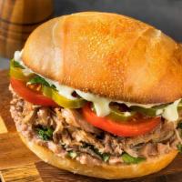 Regular Torta  · Meat, beans, lettuce, tomato, guacamole.