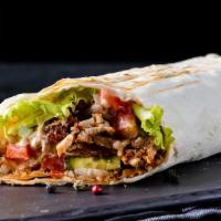 Regular Burrito · Rice, beans, meat, lettuce, cheese and salsa.