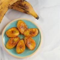 Platano Frito  · Fried plantains topping with condensed milk.