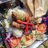 Lule Kafta Kabob Lunch Special · Luke kafta Seasoned ground lamb kabob.
All lule kafta lunch specials are served with two fre...