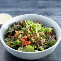 Leafy Green Salad · Mixed leafy greens, chopped tomatoes, toasted almonds, pumpkin seeds, cilantro, parsley and ...