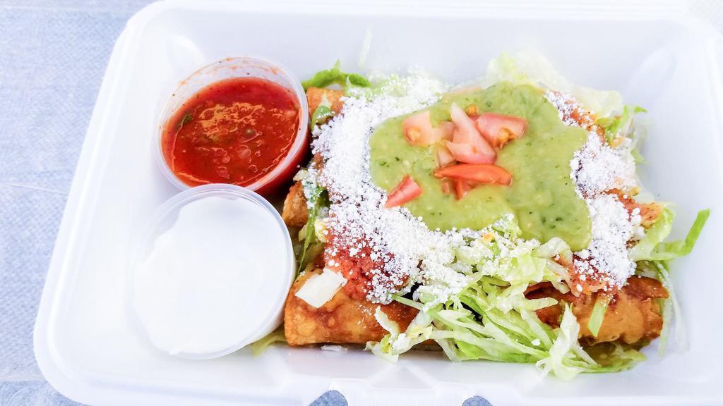 Flautas · Fried Rolled Taquitos. Topped with cheese, sour cream, lettuce.