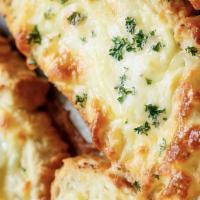 Cheese Garlic Bread · A cross between garlic bread and pizza, cheesy bread is a quick, easy, and delicious party s...