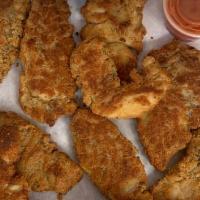 Chicken Nuggets · Delicious bite-sized chicken tenders 10 pcs.