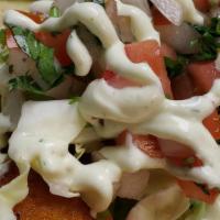 Baja Style Fish Taco · Beer batter fish, cabbage, pico de gallo and special cream.