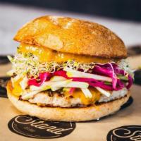 Harvest Turkey Burger On A Wheat Bun · Turkey patty, cheddar cheese, green apples, pickled red onion, alfalfa sprouts, apricot spre...