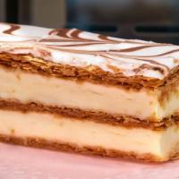 Napolean · Flaky puff pastry dessert with vanilla cream.
