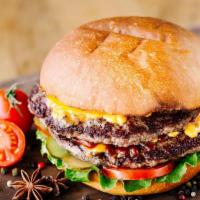 Super Burger (Double) · Juicy grilled beef burger smashed to perfection and stacked on top of fresh shredded lettuce...