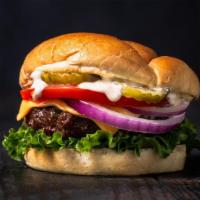 Super Cheeseburger (Single) · Juicy grilled beef burger smashed to perfection, topped with melted American cheese and stac...