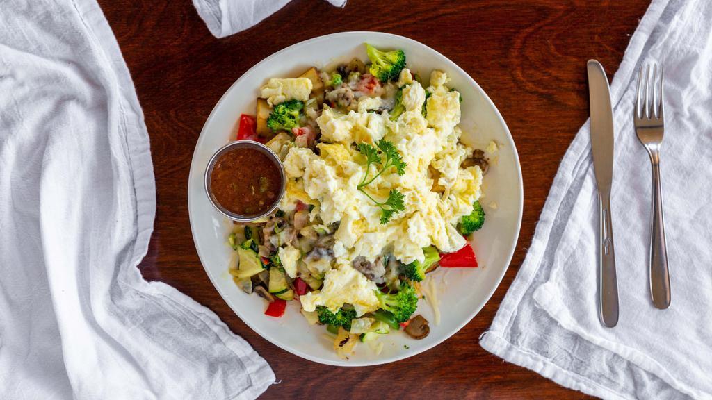 Skinny · Three egg whites,  zucchini, onions, bell peppers, Broccoli, mushrooms, and jack cheese served on country potatoes.