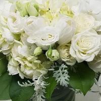 Blissful Light · Mix of white roses, Lysenthia, lilies and hydrangeas