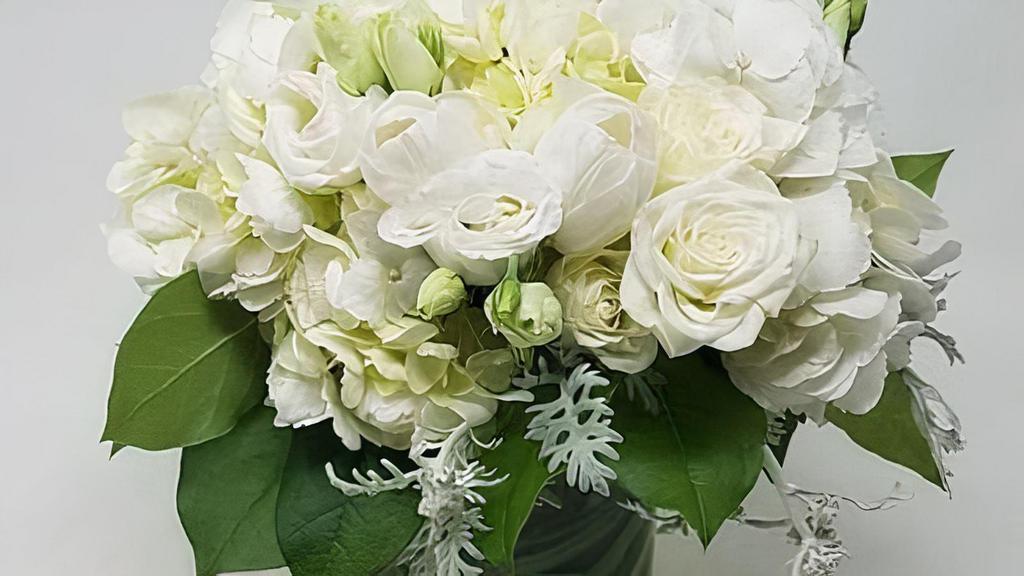 Blissful Light · Mix of white roses, Lysenthia, lilies and hydrangeas