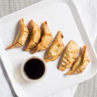 Chicken Potsticker  · Served with soy ginger vinegar sauce.