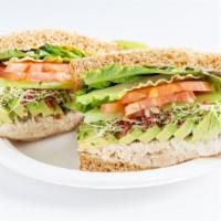 Tuna Salad Sandwich · Albacore white tuna salad (dressed lightly with mayo), lettuce, cucumbers, tomatoes, vegan b...