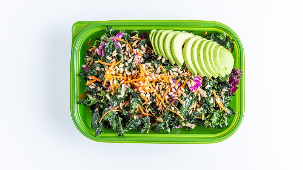 Kale Salad · Kale, avocado, feta cheese, dried cranberries, carrots, sunflower seeds tossed in tahini dressing.