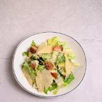 Classic Caesar · crisp romaine hearts, homemade croutons, our classic Caesar dressing shaved parmesan cheese