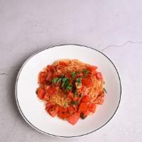 Spaghetti  Pomodoro · fresh tomatoes, torn basil and garlic, lightly sauteed with extra virgin olive oil