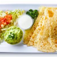 Cheese Quesadilla · Freshly cooked flour tortilla filled with cheese and grilled to perfection served with fresh...