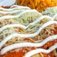 Combo Enchiladas · Two enchiladas filled with cheese or chicken and topped with our spicy red salsa or our toma...