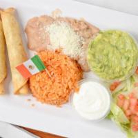 Combo Taquitos · 3 rolled taquitos served with guacamole, salad, rice and beans