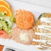 Combo Chile Relleno · 2 Chile Rellenos with rice, beans, salad and freshly made tortillas