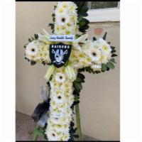 Raiders Fan Cross Arrangment · Note that all flowers, boxes or wraps will not always be available and will be changed to th...