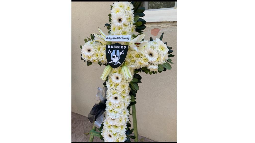 Raiders Fan Cross Arrangment · Note that all flowers, boxes or wraps will not always be available and will be changed to the closest available option.