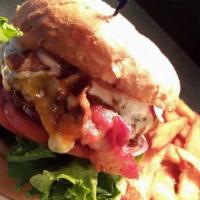 Bluebq Moo · On a kaiser bun, basted with zesty bbq sauce, topped with bacon, Cheddar and crumbled Bleu c...