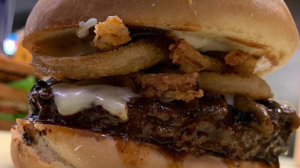 A-1 Steakhouse Moo · On a kaiser bun, basted with a-1 steak sauce, with Swiss cheese, sautéed mushrooms, mayonnaise and deep fried onion tanglers.