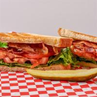Blt · Toasted white bread with bacon, lettuce, tomato, and mayonnaise.