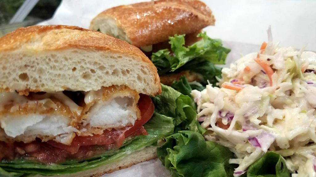 Fried Fish Sandwich · Beer battered cod fish, on a steak roll with lettuce, tomato and tartar sauce.
