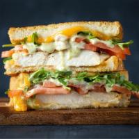 Chicken Pesto Grilled Cheese · Basic 5 Grilled Cheese with Grilled Chicken Breast, Arugula, Fresh Tomato & Pesto Aioli.