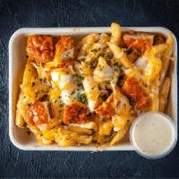 Buffalo Chicken Fries · Our Pomme Frites topped with Fried Chicken, melted Five Cheese Blend and. Buffalo spice sauc...