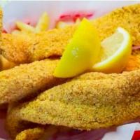Catfish W/Fries · Classic southern fried catfish dipped in a seasoned cornmeal and fried to perfection.