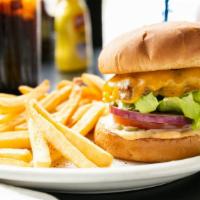 Russell'S Famous Cheeseburger · Russell's Famous Cheeseburger is made with a 1/3 pound patty, melted Cheddar cheese lettuce,...
