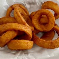 Thick Cut Onion Rings · 10 oz. basket of thick cut beer battered onion rings served with ranch dressing.