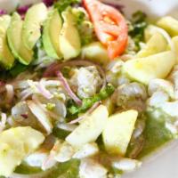 Camarones Aguachiles · Also known as camarones ahogados, citrus cooked shrimp served with red onion, sliced cucumbe...