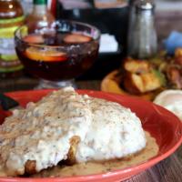 Country Fried Steak & Eggs · served with biscuit and gravy (no toast, no pancake).