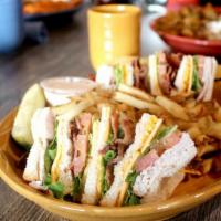 Club Sandwich · Mayo, lettuce, tomatoes, Applewood smoked bacon, turkey, and cheddar cheese.