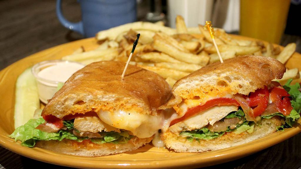 Santa Fe Sandwich · Roasted pepper aioli, chicken Breast, avocado, roasted red bell pepper, jack cheese, lettuce, and tomato served on ciabatta Bread.